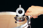 Tama TW100 Tension Watch for drums, GMI model, showing a close-up of the tension adjustment tool with brand logo visible.