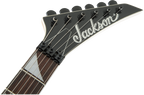 Jackson JS Series King V JS32 electric guitar with amaranth fingerboard in white with black bevels, showcasing its sleek design.