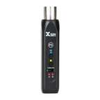 Xvive P3 XLR Bluetooth audio receiver connected to PA system, compact adapter for wireless microphone and audio streaming.