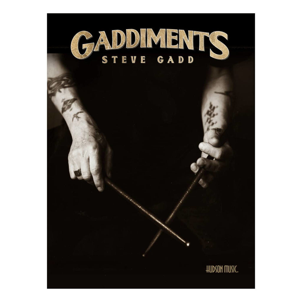 Open page of the Gaddiments Steve Gadd drum book showing sheet music and handwritten notes for drummers.