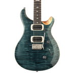PRS SE Custom 24 electric guitar in slate blue with sleek body and six-string neck, showcasing its stylish design and hardware details.