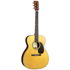 Martin M-7 Johnny Marr acoustic guitar with a natural wood finish, featuring a sleek body and detailed craftsmanship.