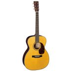 Martin 000-EC Eric Clapton 30th Anniversary acoustic guitar with a natural wood finish and detailed inlays.