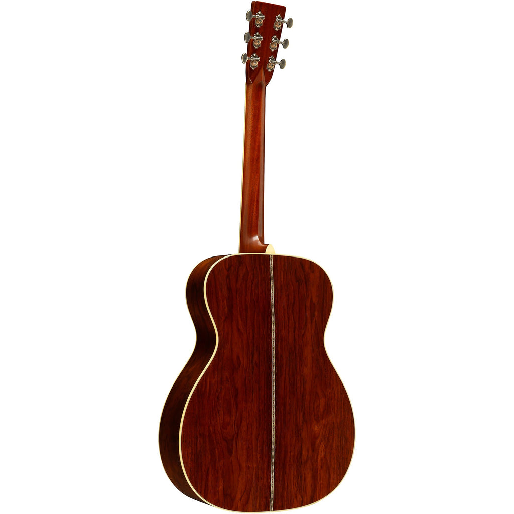Martin 000-EC Eric Clapton 30th Anniversary acoustic guitar with a natural wood finish and detailed inlay, featuring a cutaway body.