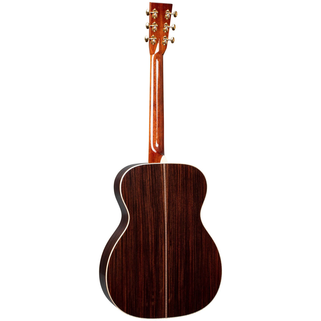 Martin 000-42 Modern Deluxe auditorium acoustic guitar with a rich wood finish and detailed craftsmanship.