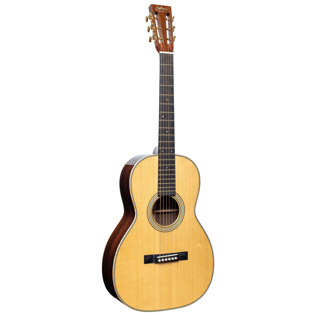 Martin 00-28MD 12-fret acoustic guitar with a rich wood finish, showcasing the compact body and detailed craftsmanship.