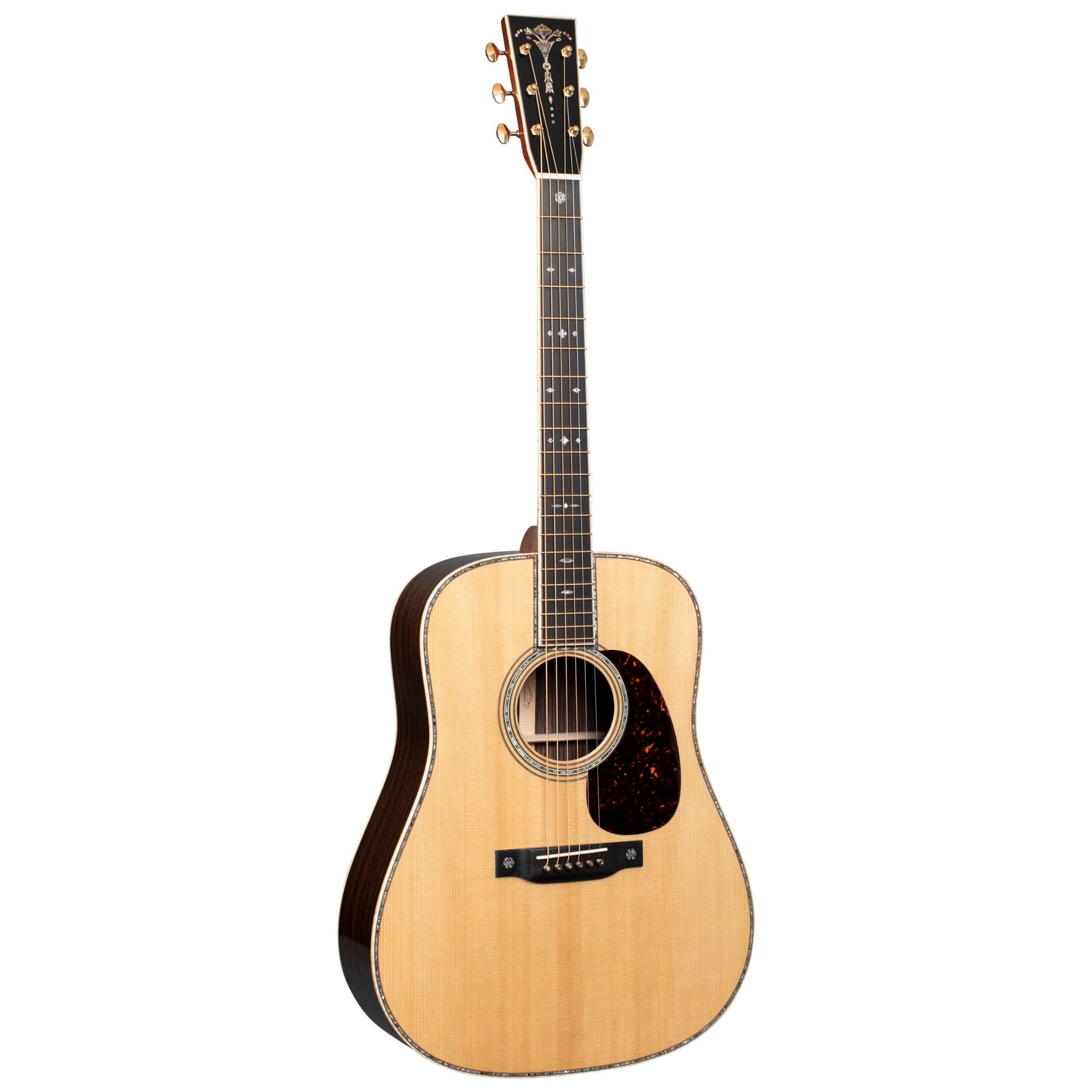 Martin D-42 Modern Deluxe dreadnought acoustic guitar with a rich wood finish and detailed inlay, showcasing its high-quality craftsmanship.