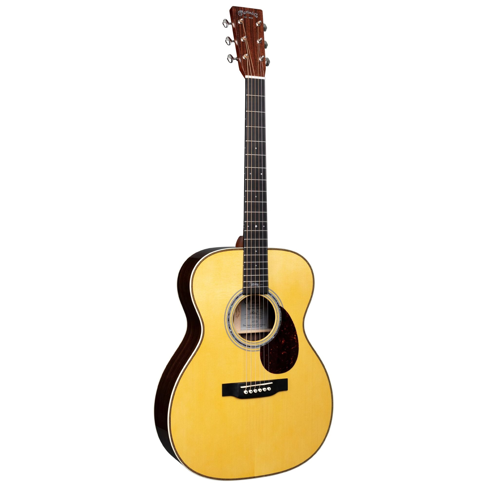 Martin OMJM Special Edition Orchestra acoustic guitar, John Mayer signature model with a natural wood finish and detailed craftsmanship.