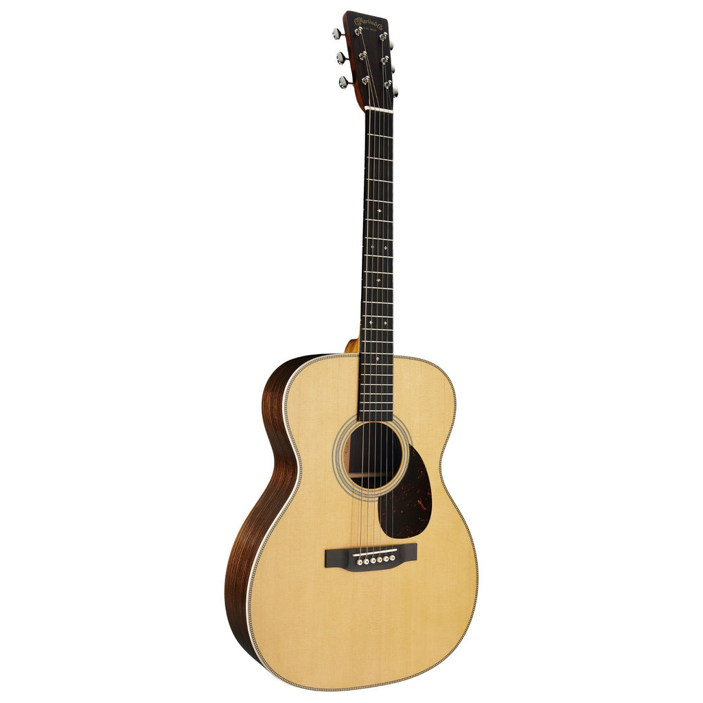Martin OM28E Standard Series acoustic guitar with AuraVT Enhance system, showcasing a natural wood finish and detailed craftsmanship.