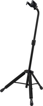 Hercules GS414BSW guitar stand holding an acoustic guitar, black metal frame with padded supports for secure, stable display.