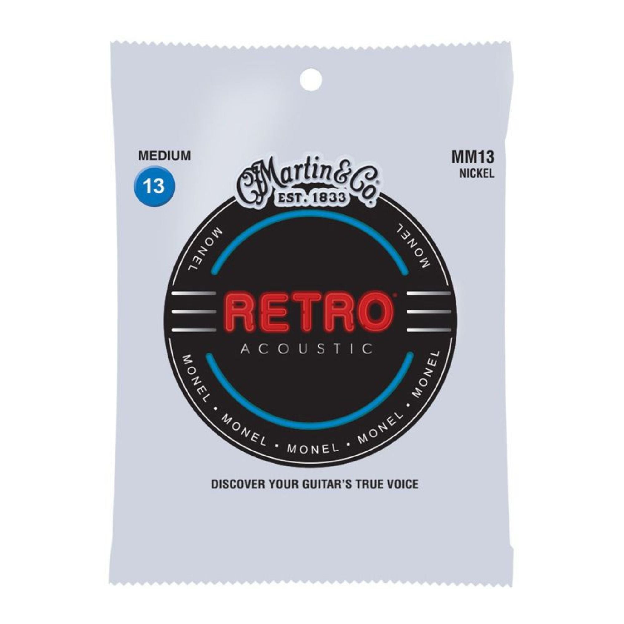 Martin Retro Medium/Light 13-56 Monel acoustic guitar strings on a guitar, showcasing their packaging and branding.
