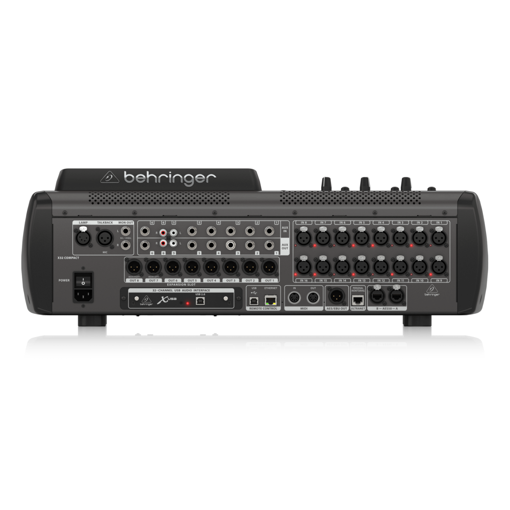 Behringer X32 digital mixer with 40 channels, compact design, featuring MIDAS preamps and multiple control knobs.