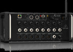 Behringer X Air XR16 digital mixer with sleek design and multiple input/output options displayed on a tabletop.