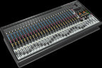 Behringer Eurodesk SX3242FX analogue mixer with multiple input channels, knobs, and faders for professional audio mixing.