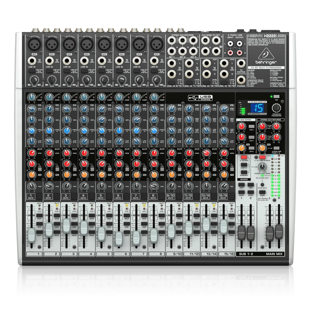 Behringer Xenyx X2222USB analogue mixer with multiple input channels, knobs, and USB output for audio mixing and recording.