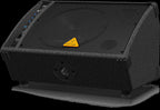 Behringer Eurolive F1320D 12-inch powered PA speaker with control panel and speaker grille, used as a foldback monitor.