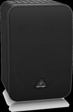 Behringer 1C-BK 5-inch powered studio monitor speakers pair, showing black finish and compact design for audio production.