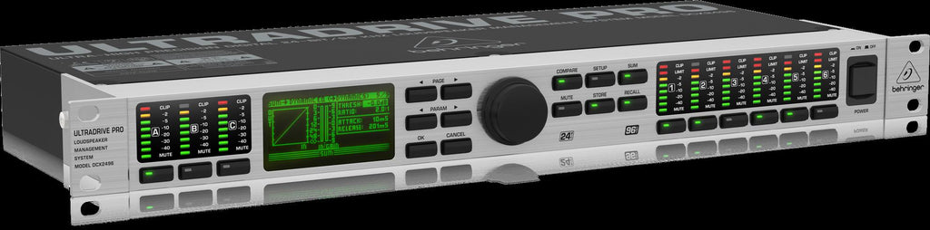 Behringer Ultradrive Pro DCX2496 live outboard audio processor with control knobs and display screen.