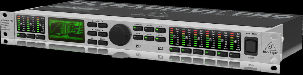 Behringer Ultradrive Pro DCX2496 live outboard audio processor with control knobs and digital display for sound management.