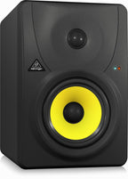 Behringer TRUTH B1030A 5-inch studio monitor speaker showing a black cabinet with control knobs and speaker grille.