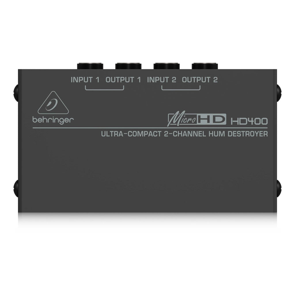 Behringer MicroHD HD400 Hum Destroyer in a live outboard gear setup, showing the compact audio noise suppressor device.