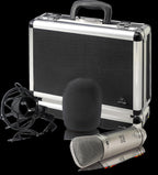 Behringer B2Pro condenser studio microphone with black body and silver grille, mounted on a stand.