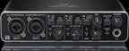 Behringer U-Phoria UMC204HD USB audio interface with two inputs and MIDI connectivity on a sleek design.