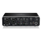 Behringer U-Phoria UMC202HD audio interface with multiple input and output ports, compact design for home recording.
