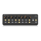 Behringer X-Touch Mini USB MIDI controller with knobs, buttons, and compact design for music production and control.