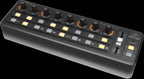 Behringer X-Touch Mini USB MIDI controller with knobs and buttons for music production and digital audio control.
