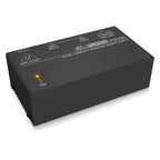 Behringer PS400 MicroPower ultra-compact phantom power supply for live outboard equipment, shown in a close-up image.