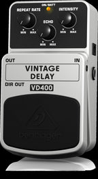 Behringer VD400 Vintage Analog Delay guitar effects pedal with control knobs and input/output jacks, used for guitar sound effects.