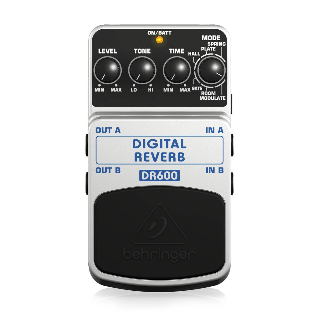 Behringer DR600 Digital Reverb Effects Pedal showing controls and input/output jacks on a tabletop.