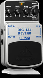 Behringer DR600 digital reverb effects pedal with control knobs and input/output jacks, used for guitar and instrument effects.