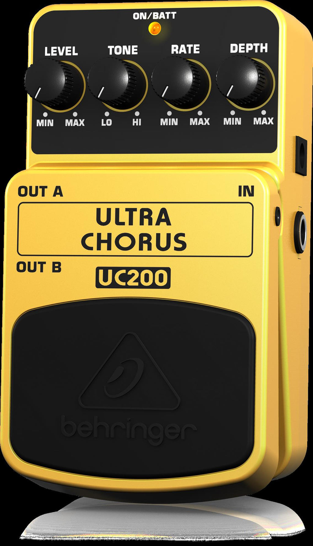 Behringer UC200 Ultra Chorus effects pedal with control knobs and input/output jacks on a pedalboard.