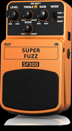 Behringer SF300 Super Fuzz effects pedal with black compact metal casing and control knobs for guitar sound effects.