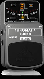 Behringer TU300 chromatic tuner pedal with LED display and control knobs for guitar and bass tuning.
