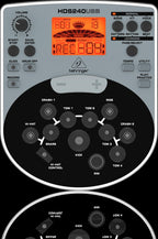 Behringer XD80USB electronic drum kit with multiple drum pads, cymbals, and control module for electronic drumming.