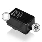 Behringer PSU11-SAA power supply for PA systems, compact and reliable audio accessories, shown with connected cables.