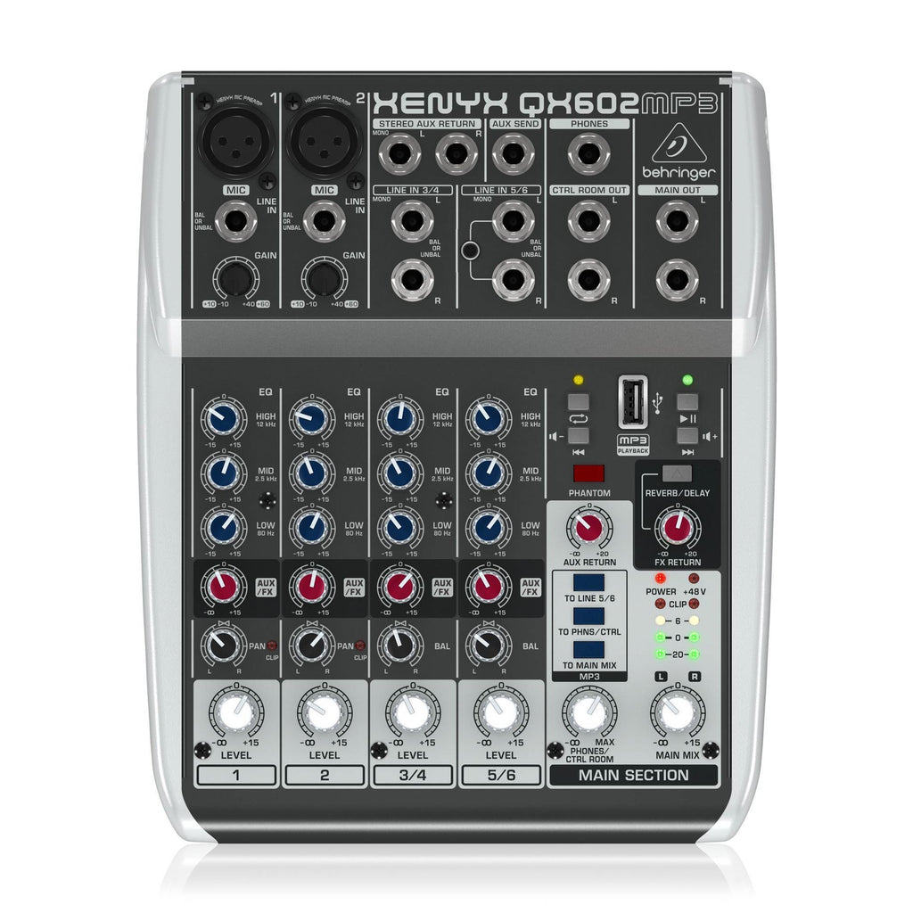 Behringer Xenyx QX602MP3 analogue mixer with multiple channels, knobs, and input jacks for audio mixing and sound control.
