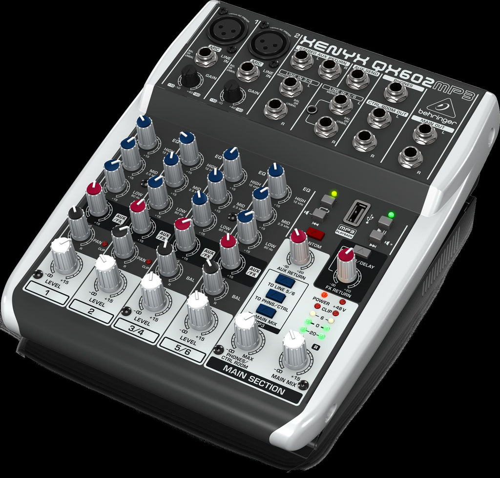 Behringer Xenyx QX602MP3 analogue mixer with multiple input channels, knobs, and audio controls for live sound and recording.