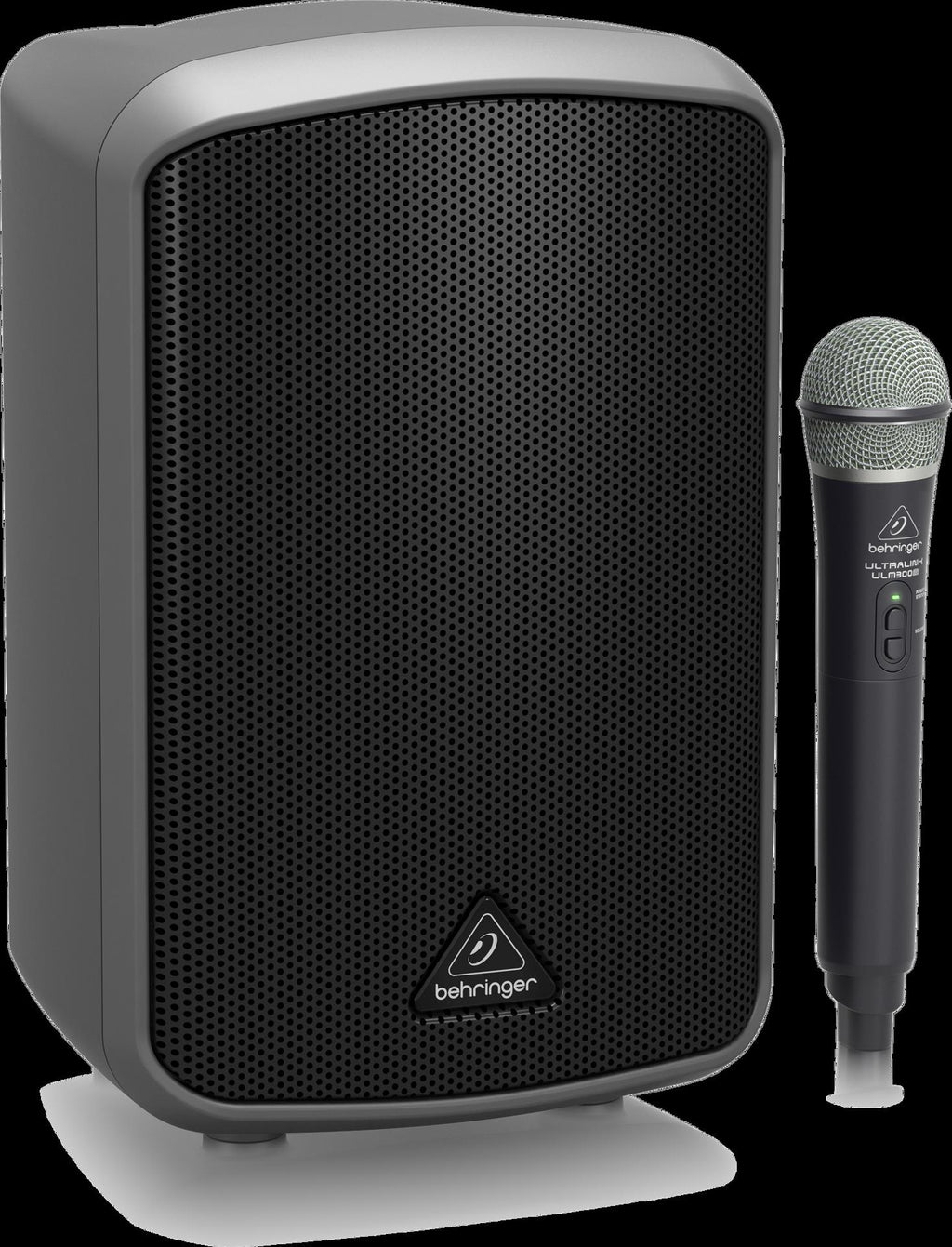 Behringer Europort MPA100BT package PA system with 100w speaker and microphone in a home setting.