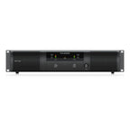 Behringer NX3000 power amplifier with SmartSense display, shown with control knobs and input connections for audio amplification.