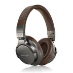 Behringer BH470 studio closed-back headphones with padded ear cups and adjustable headband, designed for professional audio monitoring.