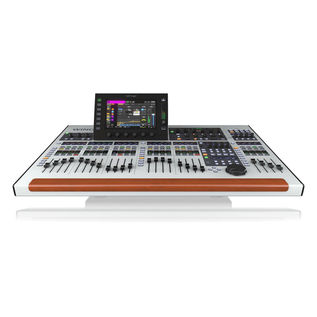 Behringer Wing digital mixing console with touchscreen, faders, knobs, and professional audio controls