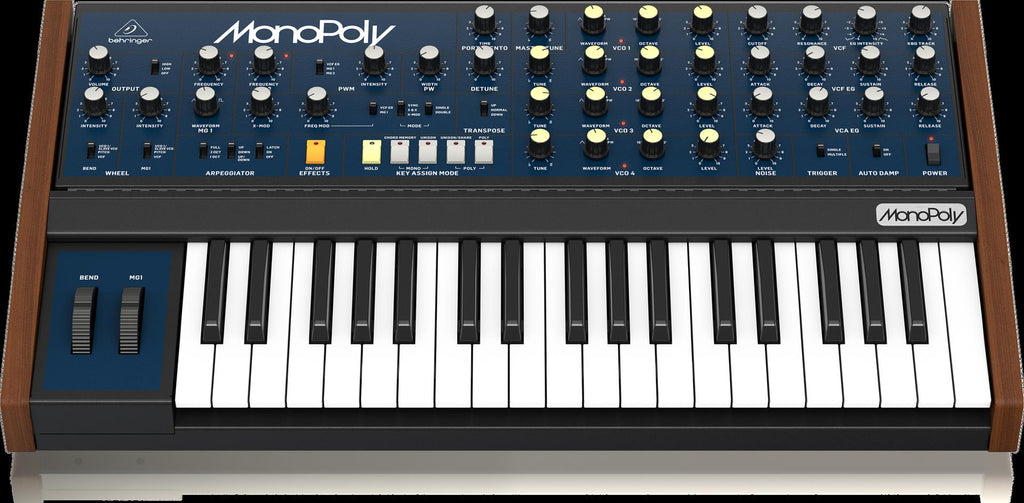 Behringer Monopoly analog polyphonic synthesizer keyboard with vintage-style controls and colorful patch panel.