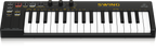 Behringer Swing 32-Key USB controller keyboard with a sleek design and illuminated keys on a black background.