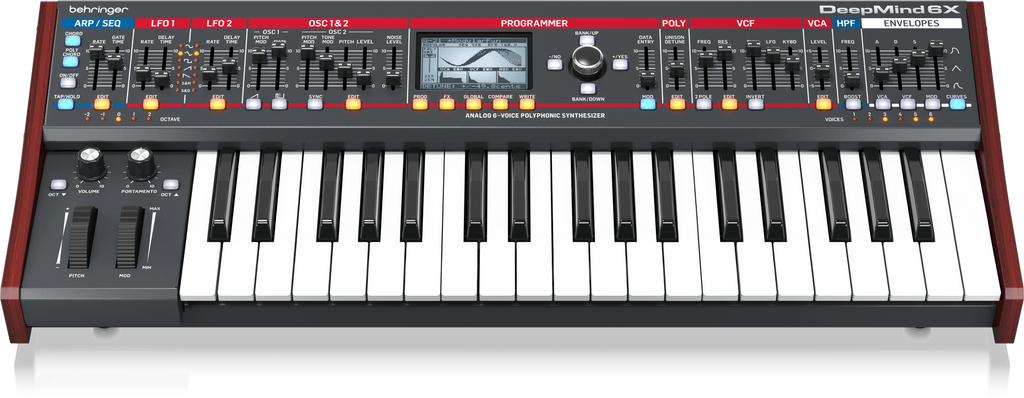Behringer Deepmind 6X true analog 6-voice polyphonic synthesizer keyboard with knobs and keys, close-up view.