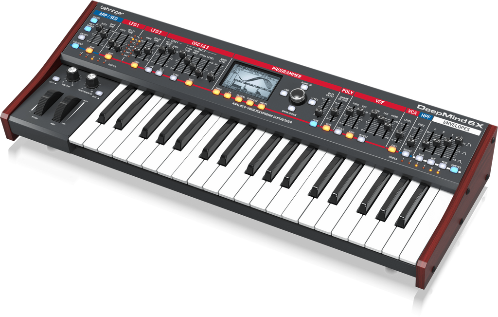 Behringer Deepmind 6X true analog 6-voice polyphonic synthesizer keyboard, showing knobs and controls on the front panel.