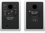 Pair of Behringer Truth 3.5 studio monitor speakers with Bluetooth in white, showing the sleek compact design.